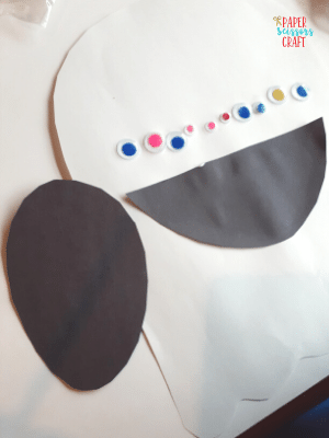 Ghost cutout with eyes and mouth.