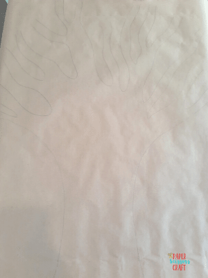 Thankful tree outline on craft paper with a pencil.