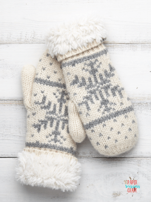 White mittens with gray snowflake in the center.