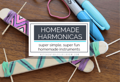 Homemade harmonicas on a table.