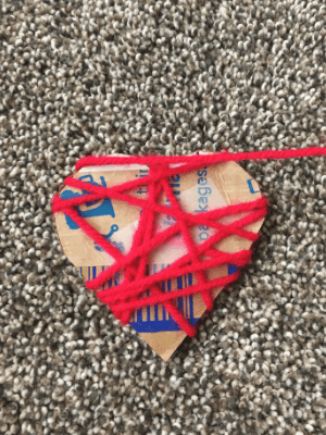 Yarn hearts Valentine's craft for kids.